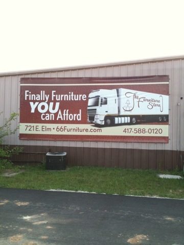 A sign for a furniture store that says "Finally furniture YOU can afford"