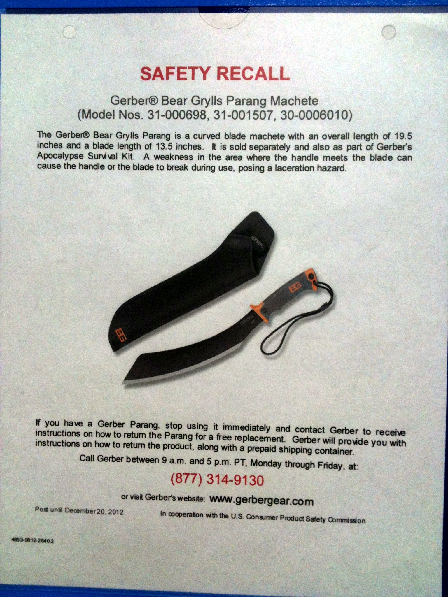 Photo of a sign at Walmart informing customers of a safety recall for a machete