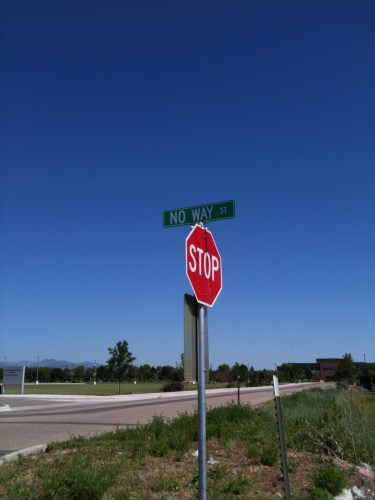 Photo of a street sign that reads "No Way St"