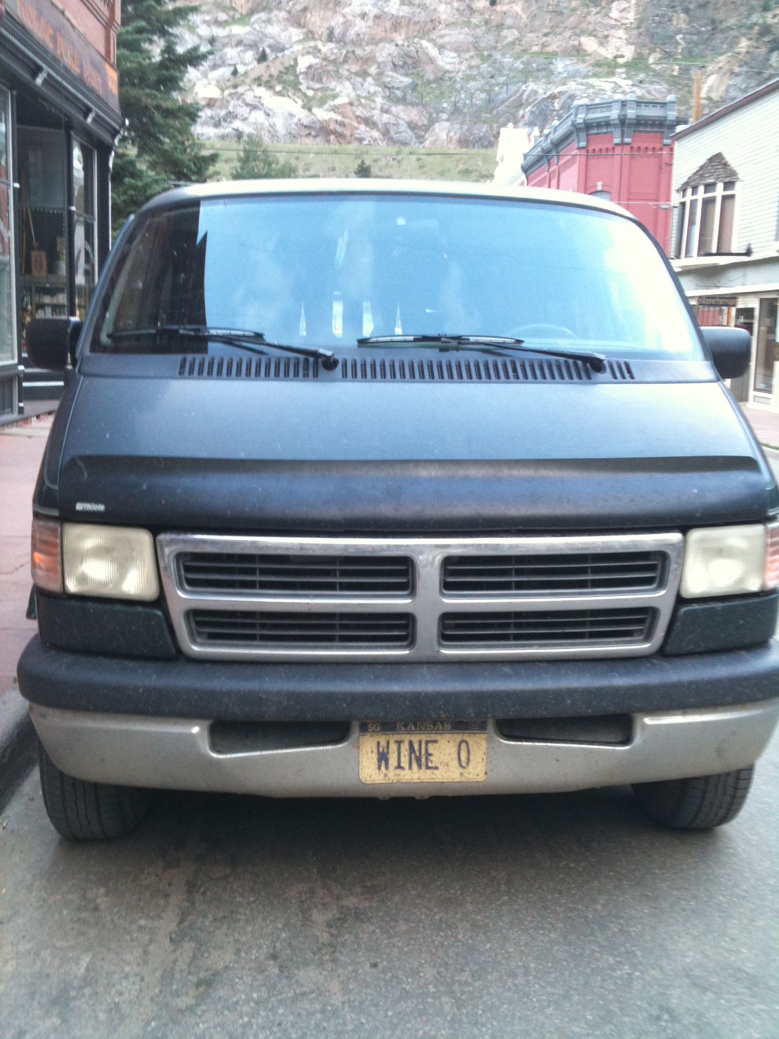 Photo of a van with a license plate that says "Wine-O"